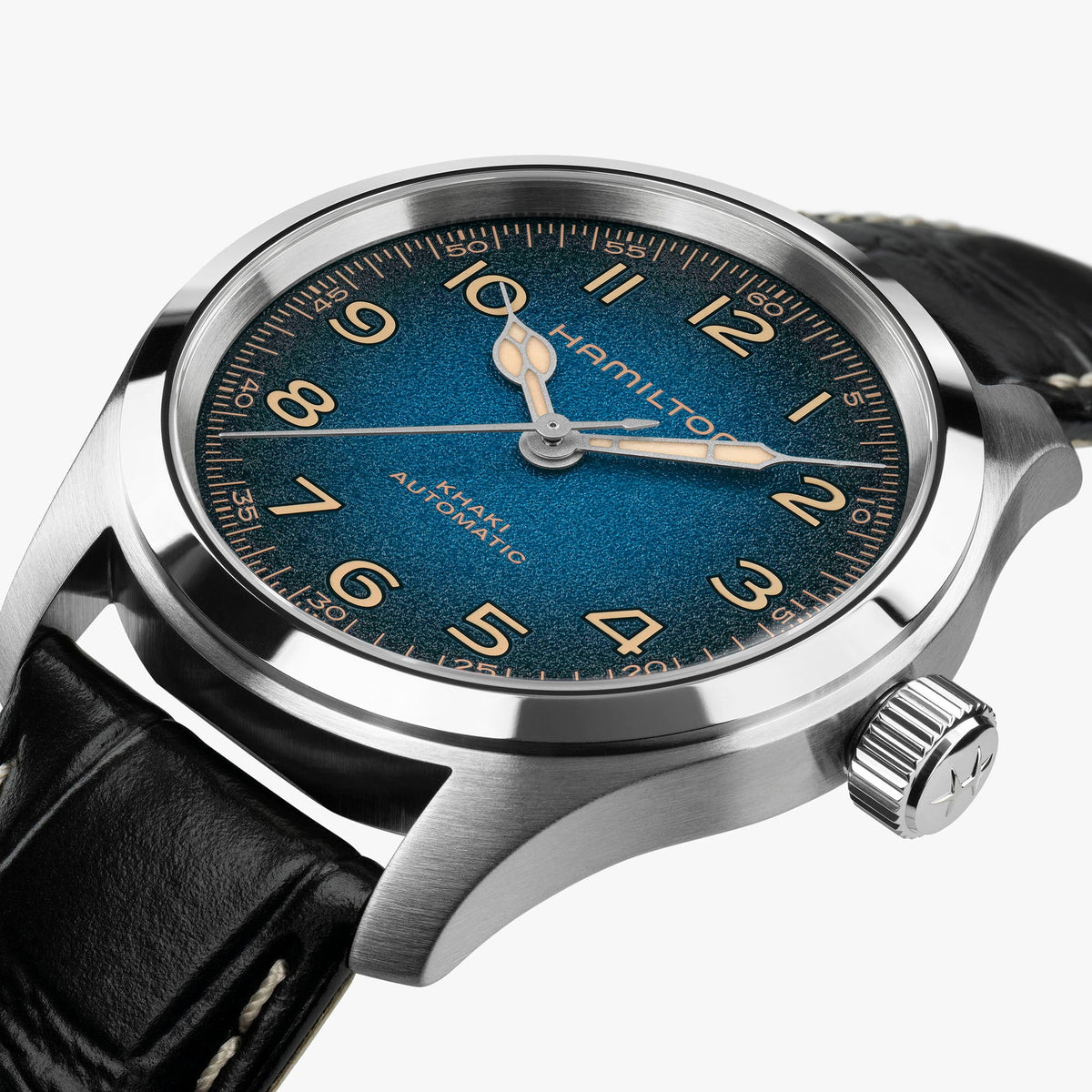 A close-up of the Hamilton Khaki Field Murph Auto 38mm Watch by Hamilton Watch, featuring an automatic calibre movement, a textured blue-to-black dial with gold-tone numerals, and a black leather strap.