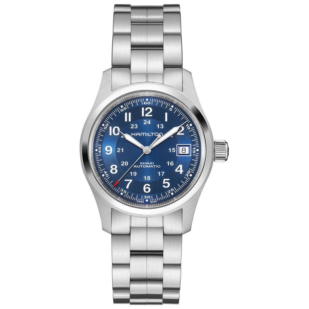The Hamilton Khaki Field Auto 38mm Watch by Hamilton Watch features a stainless steel case, blue dial with white Arabic numerals, H-10 automatic movement, date at 3 o’clock, luminous hands and markers, and a silver metal bracelet.