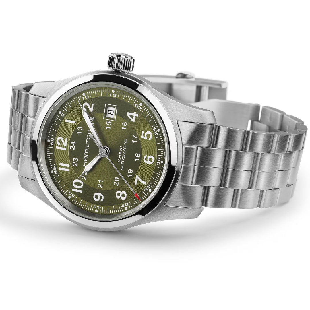 The Hamilton Khaki Field Auto 42mm Watch by Hamilton Watch features a stainless steel case, green dial, silver hour markers, date at 3 o’clock, and a metal link bracelet. The classic military-style face displays the "Hamilton" brand name.