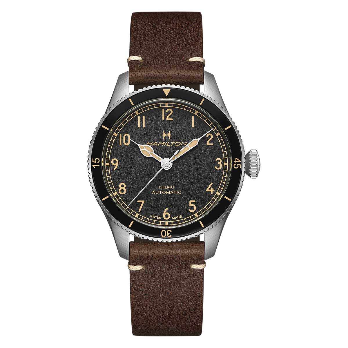 The Hamilton Khaki Aviation Pilot Pioneer Auto 38mm Watch from Hamilton Watch boasts a dark round dial with beige numerals and a brown leather strap. Reflecting its aviation roots, the watch face includes minute markers and a star emblem, enhanced by a silver crown on the right side.