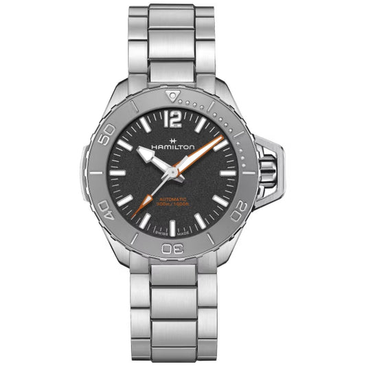 The Hamilton Khaki Navy Frogman Auto 41mm Watch by Hamilton Watch features a dark gray dial with silver indices, hands with orange accents, and a rotating bezel. It includes a stainless steel bracelet and is labeled "Automatic 300m/1000ft" on the face.