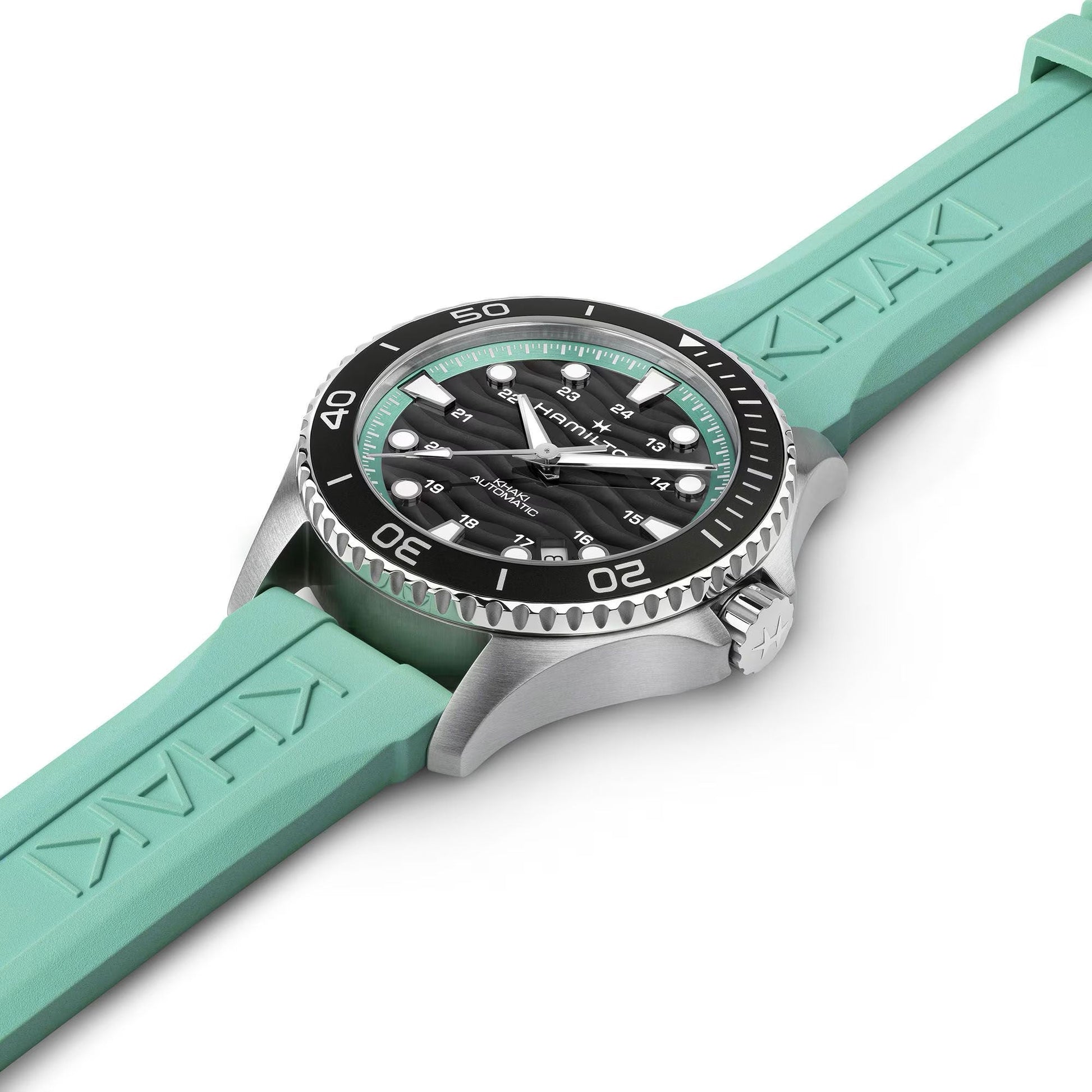 The Hamilton Khaki Navy Scuba Auto 40mm Watch by Hamilton Watch features a silver case, black and green dial, rotating black bezel, light green "KHAKI"-engraved strap, luminous markers and hands, plus date window for clear visibility.