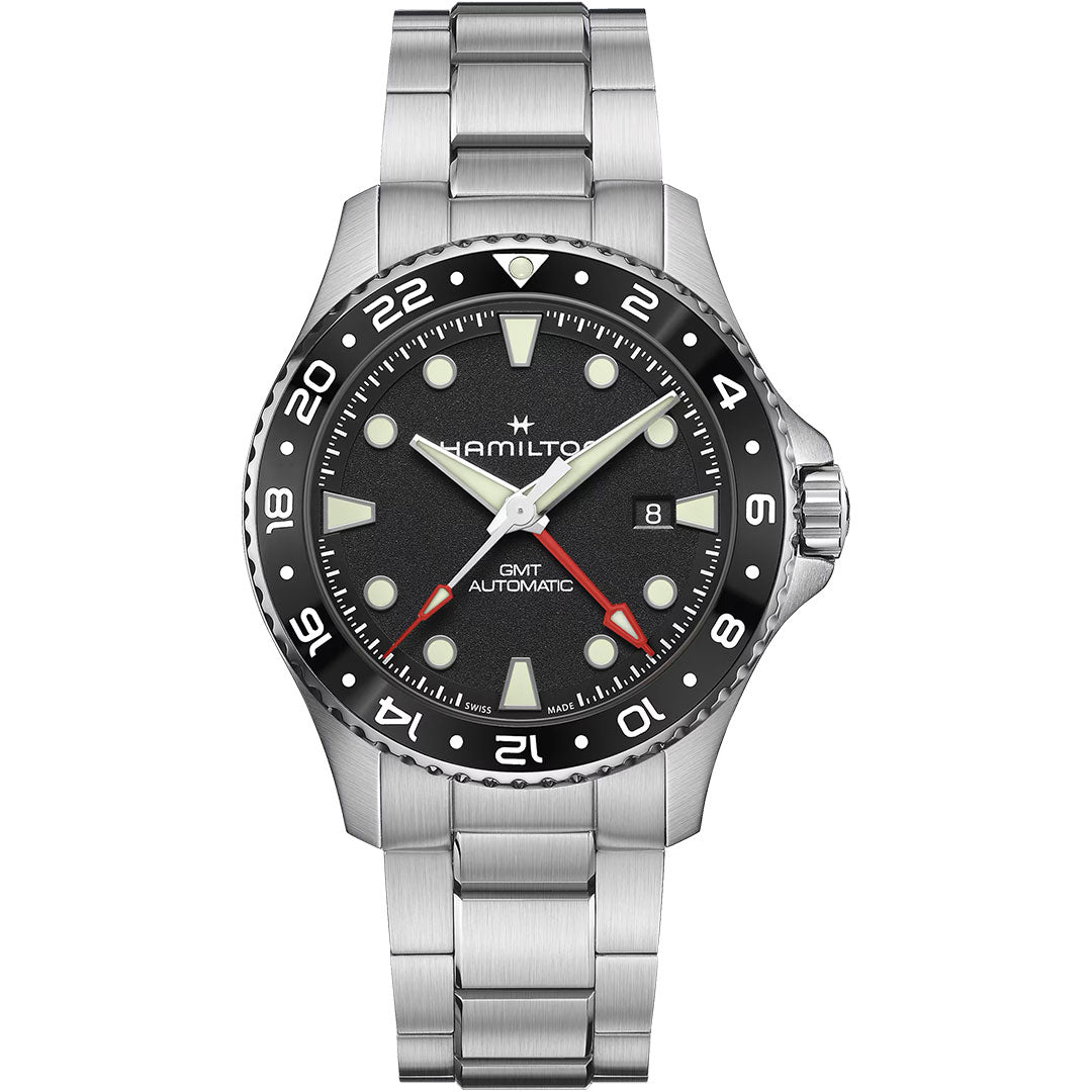 The Hamilton Khaki Navy Scuba Auto GMT 43mm by Hamilton Watch features a stainless steel case, black bezel and dial, luminous markers, red GMT hand, date at 3 o'clock, and metal bracelet—a standout automatic GMT diving watch.