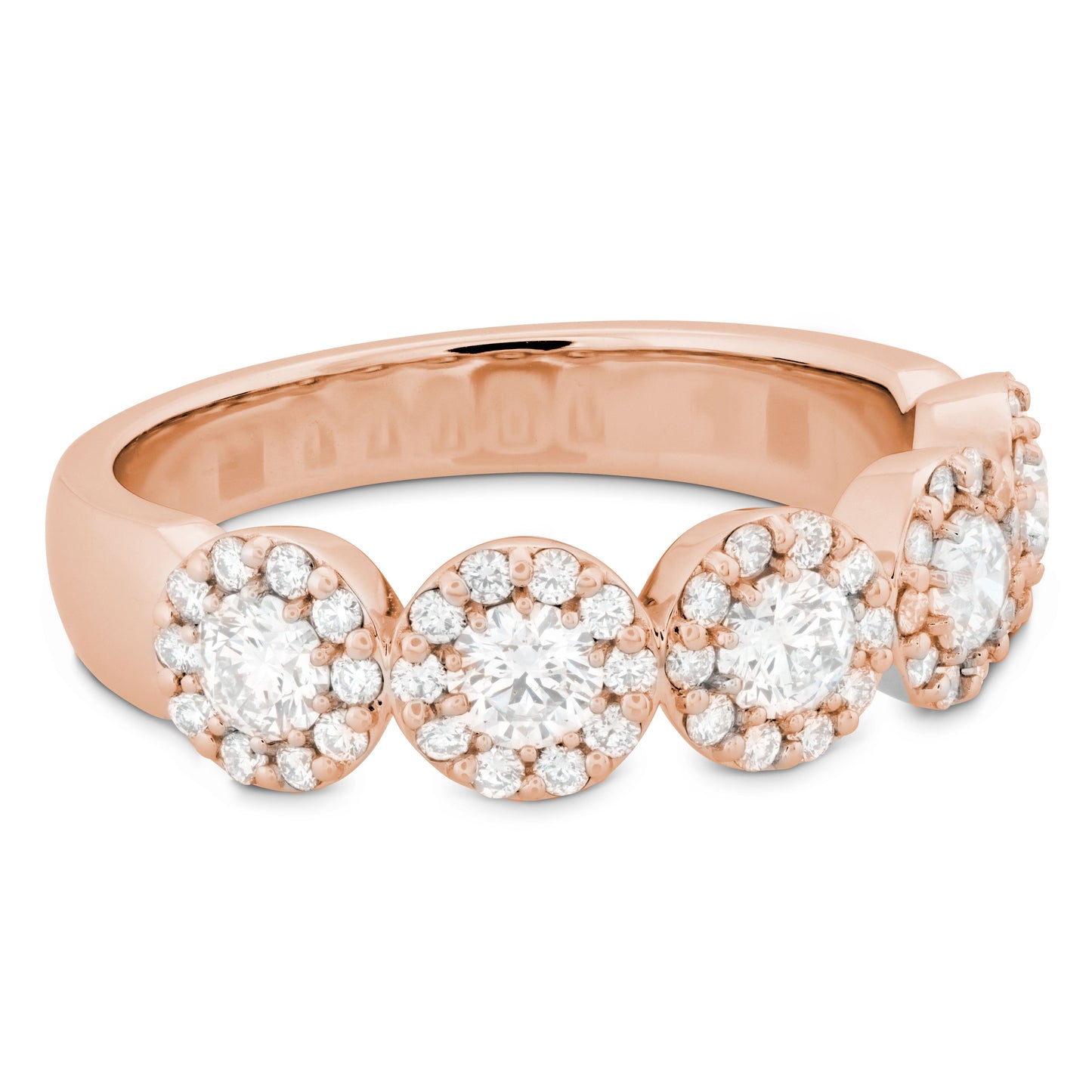 Introducing the Hearts On Fire 18K Rose Gold Round Brilliant Diamond Anniversary Ring: a timeless piece of elegance, showcasing four standout round diamonds encircled by halos of smaller diamonds for a radiant and sophisticated design.