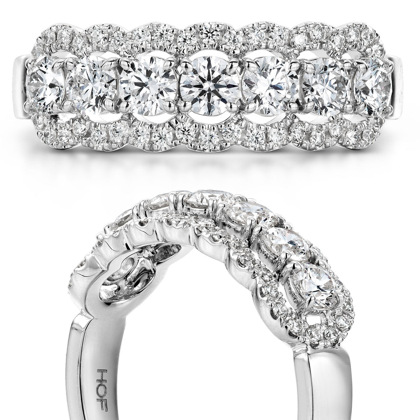 Introducing the Hearts On Fire Aurora 18K White Gold Round Brilliant Diamond Fashion Ring, a sophisticated piece crafted from 18 Karat white gold. It features a stunning floral arrangement of round-cut diamonds and showcases exquisite detailing on the inner band.