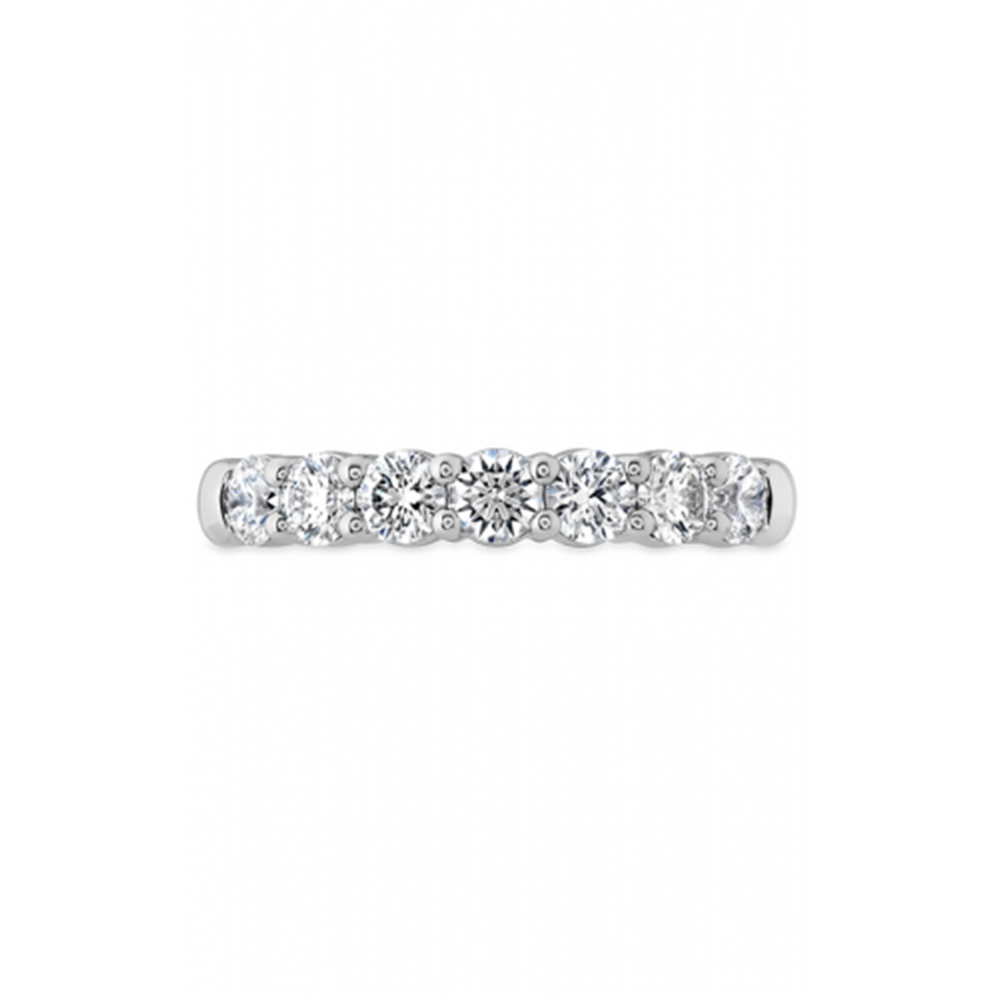 The Hearts On Fire Signature 18K White Gold Round Brilliant Diamond Anniversary Ring, featuring seven evenly spaced sparkling round diamonds, is a testament to the renowned brilliance of Hearts on Fire against a white background.