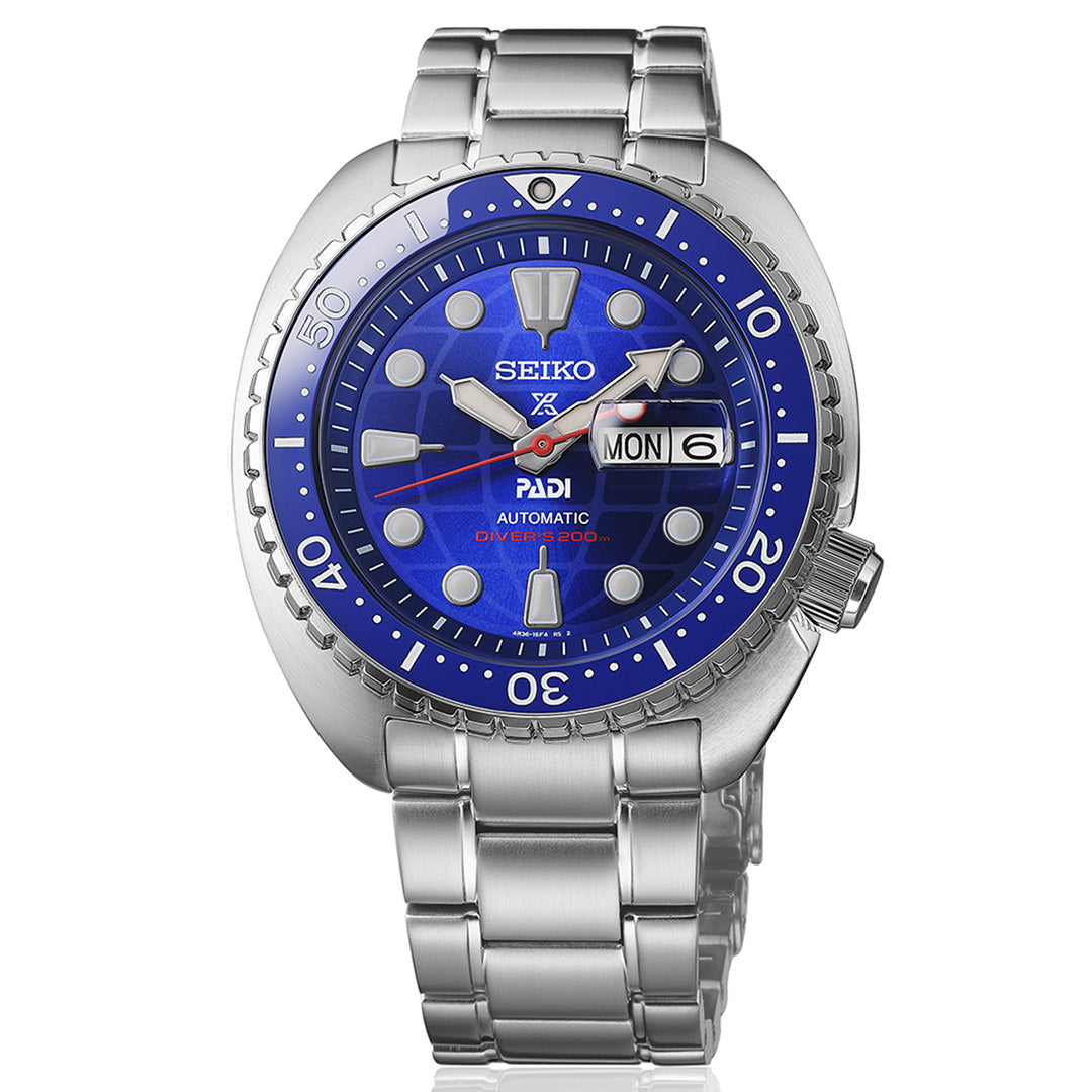 Seiko Prospex Sea 60th Anniversary Limited Edition Automatic 45mm Watch PADI, featuring a robust stainless steel case, blue bezel, blue wave-pattern dial with silver hour markers, metal bracelet, and a date and day display showing “MON 6”.