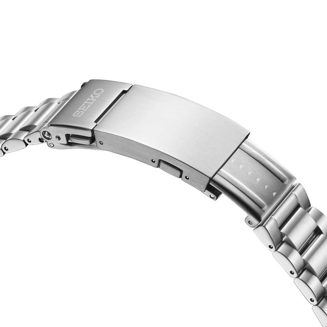 Close-up of the stainless steel bracelet of a Seiko Prospex Sea GMT Automatic With Manual Winding 42mm Watch, featuring a folding deployment clasp with a safety release.