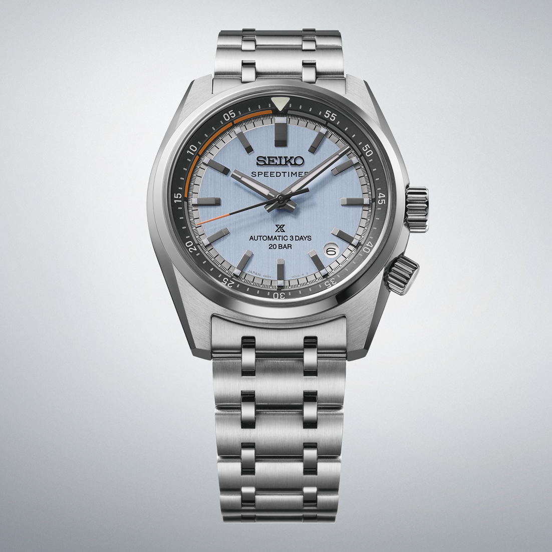 Seiko Prospex Speedtimer Automatic With Manual Winding 39.5mm watch featuring an analog motorsports design with a light blue textured dial, silver-tone markers, and a stainless steel link bracelet.