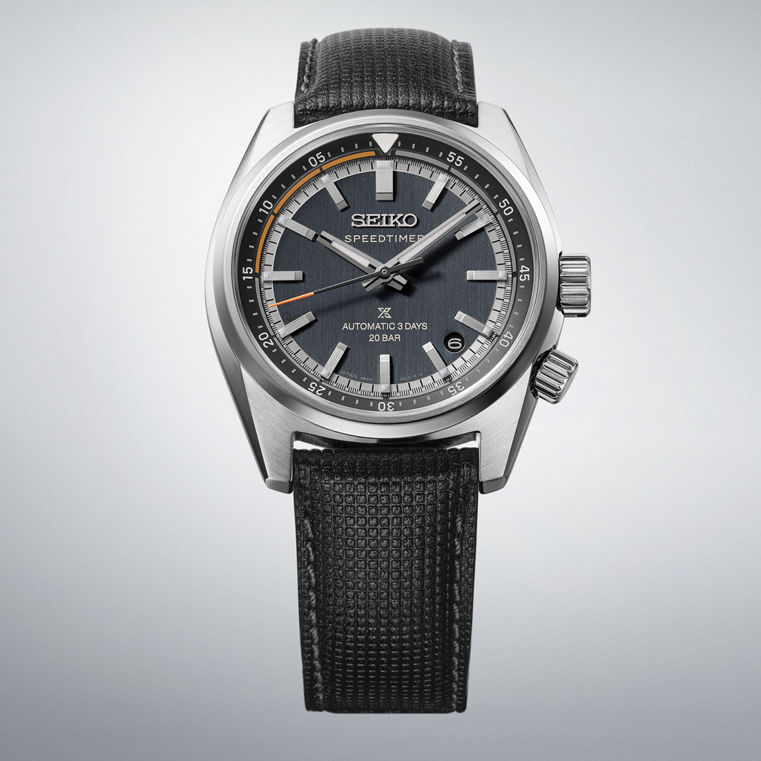 Seiko Prospex Speedtimer Automatic With Manual Winding 39.5mm Watch featuring a highly legible, dark gray textured dial, silver-tone markers, and a black patterned leather strap.