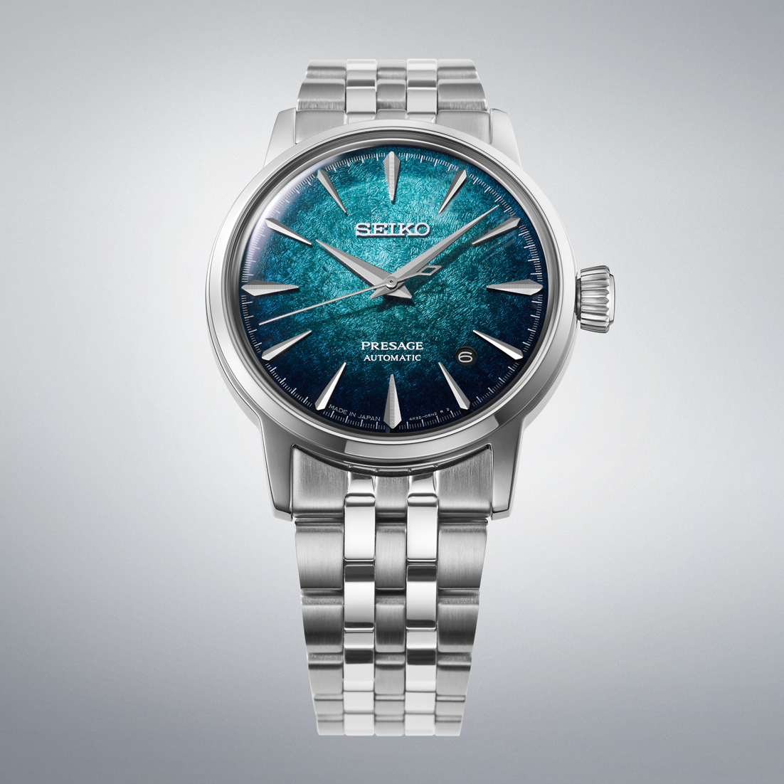 Seiko Presage Cocktail Time Automatic With Manual Winding 38.5mm watch with a textured teal dial, silver hands and hour markers, and a stainless steel link bracelet.