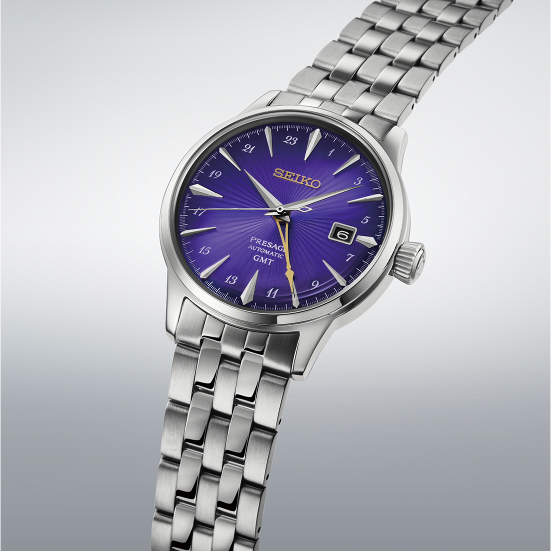 Seiko Presage Cocktail Time GMT 145th Anniversary Limited Edition Automatic With Manual Winding 40.5mm Watch featuring an Edo purple sunray dial, silver indices, a GMT hand, and a stainless steel link bracelet.