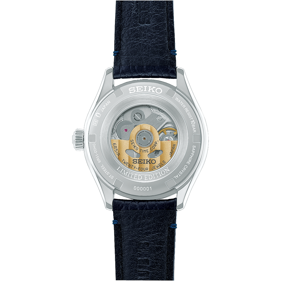 The clear case back of a Seiko Presage Classic Series 145th Anniversary Limited Edition Automatic With Manual Winding 36mm Watch reveals its mechanical movement, paired with a dark blue leather strap.