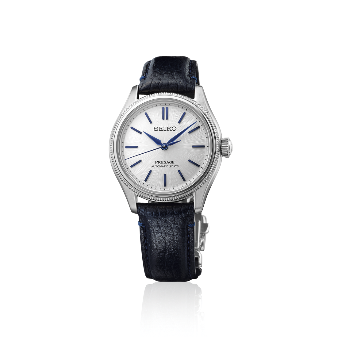 A Seiko Presage Classic Series 145th Anniversary Limited Edition Automatic With Manual Winding 36mm Watch featuring a textured light silver dial, blue hands and markers, and a dark blue leather strap.