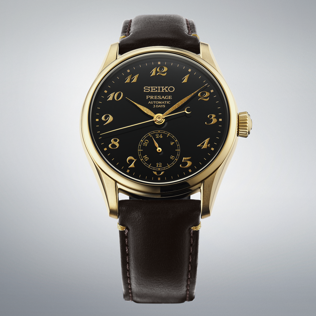 Seiko Presage Classic Series Automatic With Manual Winding 39.6mm watch in gold-tone, featuring a black Urushi lacquer dial with gold numerals and a dark brown leather strap.