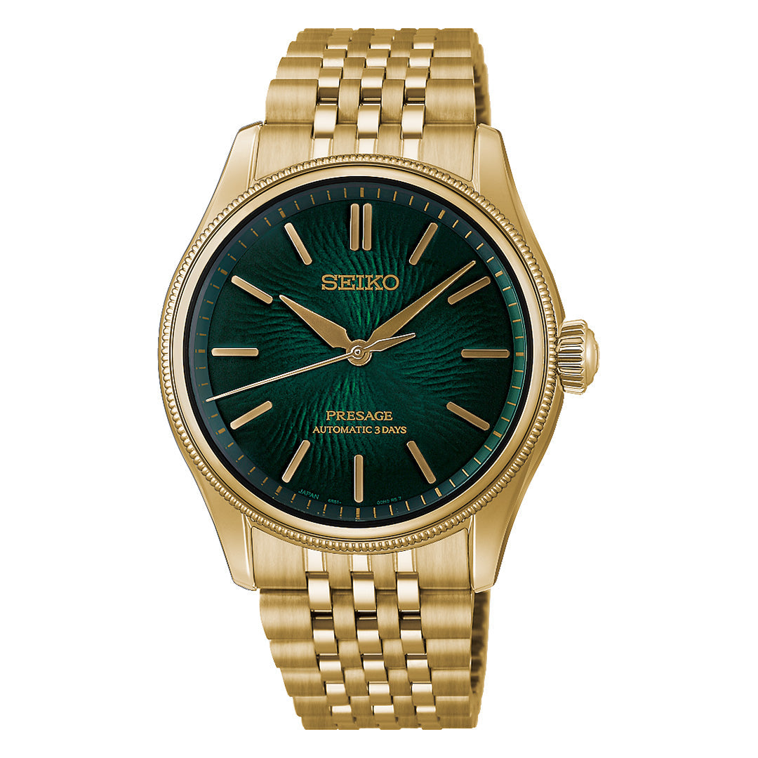 A Seiko Presage Classic Series Tradman’s Bonsai Automatic 38mm wristwatch in gold, featuring a green dial with gold hour markers and hands, and a metal link bracelet. This limited edition timepiece—one of only 2,000 pieces—displays “Seiko Presage Automatic 3 Days” on the dial.