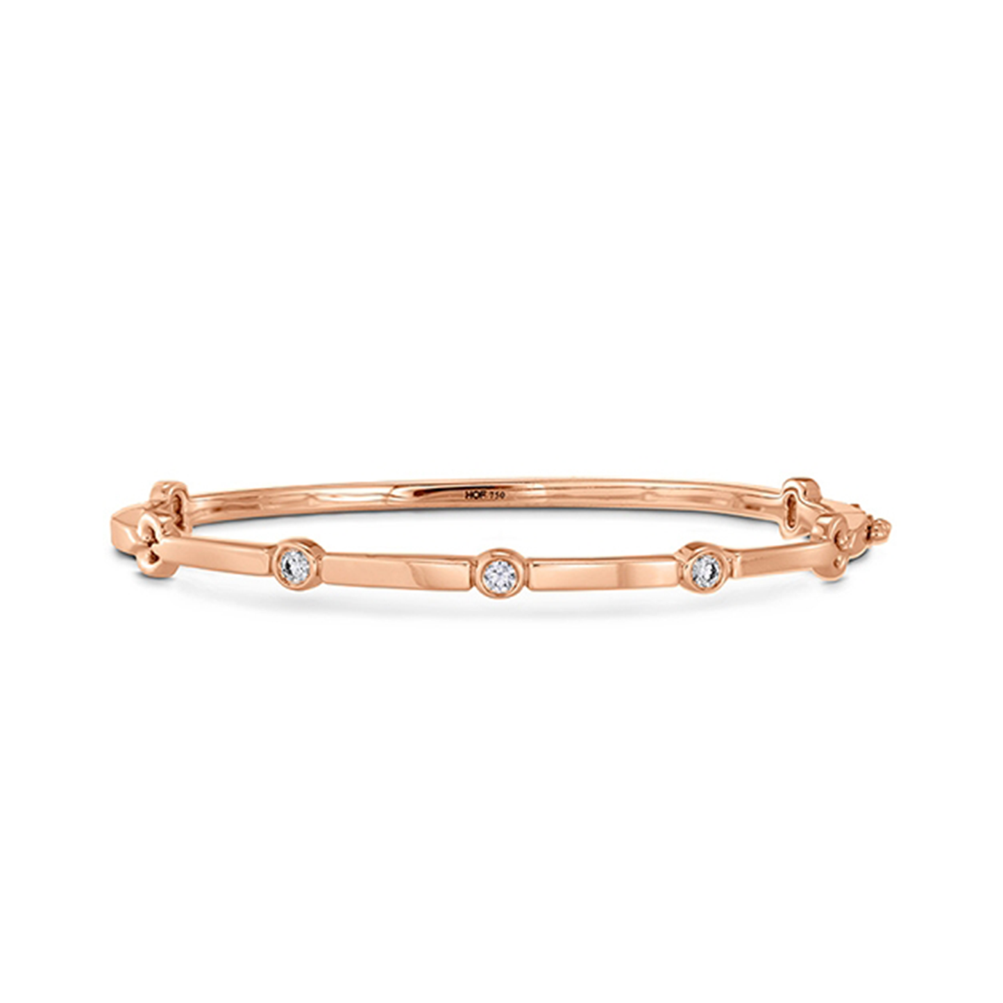 The Hearts On Fire 18K Rose Gold Copely Bangle, crafted by Hearts on Fire, features a sleek design adorned with three evenly spaced round diamonds. The polished surface radiantly reflects light, and its secure clasp makes it an elegant addition to any jewelry collection.