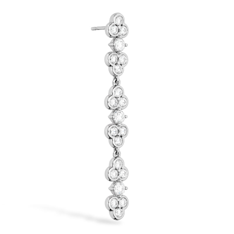 Explore the sophistication of the Hearts On Fire Effervescence Drop Earrings by Hearts on Fire, crafted in 18 Karat White Gold. These elegant long earrings showcase a vertical arrangement of flower-shaped motifs, each adorned with dazzling round diamonds. They are finished with a secure post-back closure for enduring comfort and style.