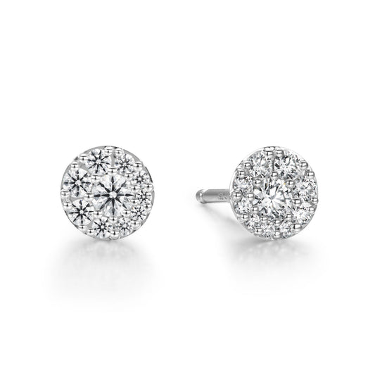 Explore the sophistication of the Hearts On Fire Tessa 18K White Gold Earrings, showcasing a dazzling cluster design. One earring is displayed front-facing to reveal its intricate detailing, while the other is angled to emphasize the post and setting. A classic piece for any jewelry collection.