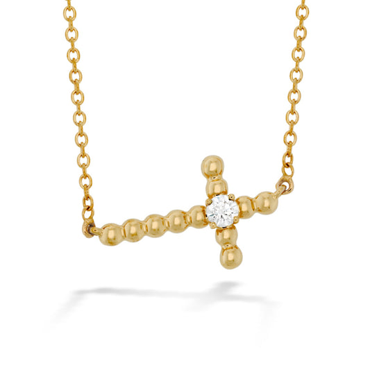 The Hearts On Fire Diamond Charmed Horizontal Beaded Cross Necklace by Hearts on Fire features a stunning beaded cross design with a central brilliant diamond, crafted in 18 Karat White Gold. The minimalist chain enhances the pendant's elegant and simple appearance, embodying true sophistication.