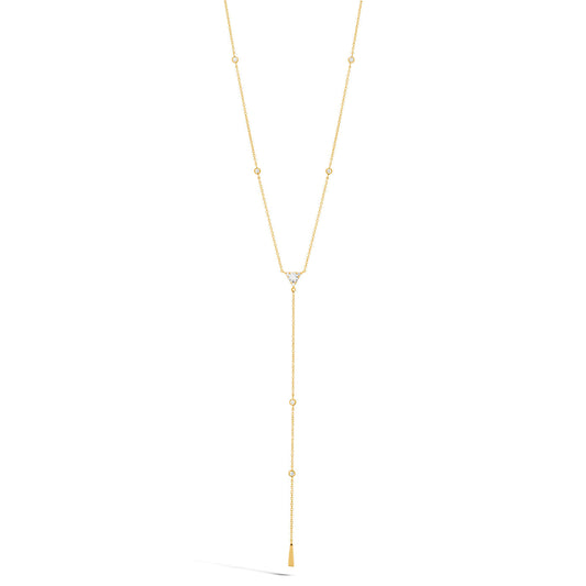 The Hearts On Fire Triplicity 18K Yellow Gold Triangle Lariat is a delicate necklace adorned with small beads along the chain and a central triangle-shaped accent. It features a vertical drop ending in a thin bar, elegantly displayed against a white background.