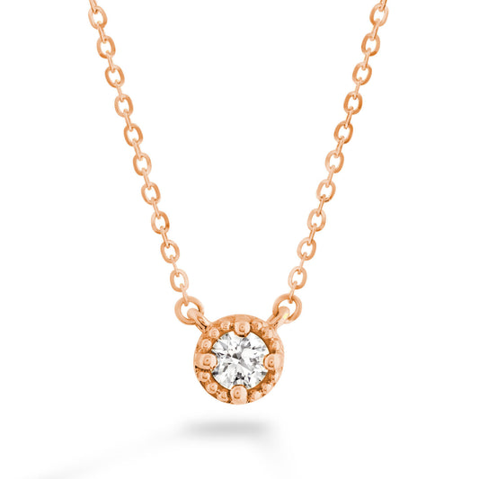 The Hearts On Fire Liliana 18K Rose Gold Milgrain Necklace by Hearts on Fire features a round pendant adorned with a dazzling diamond at its center, elegantly framed by a delicate link chain.