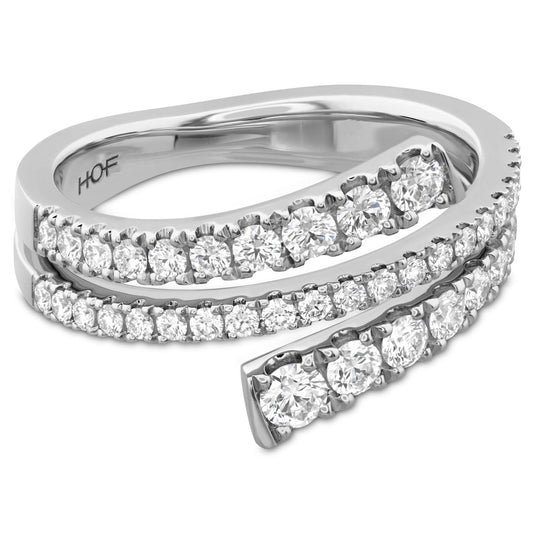 The Hearts On Fire Grace 18K White Gold Round Brilliant Diamond Wrap Fashion Ring by Hearts on Fire is a spiral-shaped piece that features multiple round diamonds. Made from 18 Karat white gold, this ring showcases a unique and modern design with a polished finish.