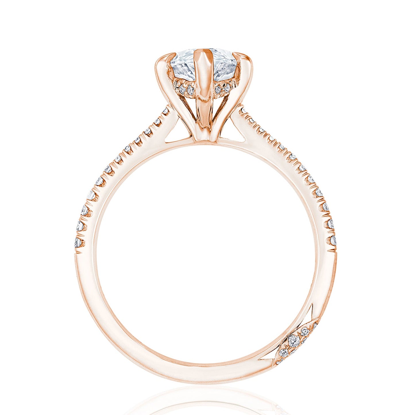 Side view of the Tacori Founders Collection engagement ring in 18K rose gold, showcasing a prominent pear-cut solitaire diamond in a prong setting. The band is embellished with pavé-set diamonds, adding an extra touch of sparkle.