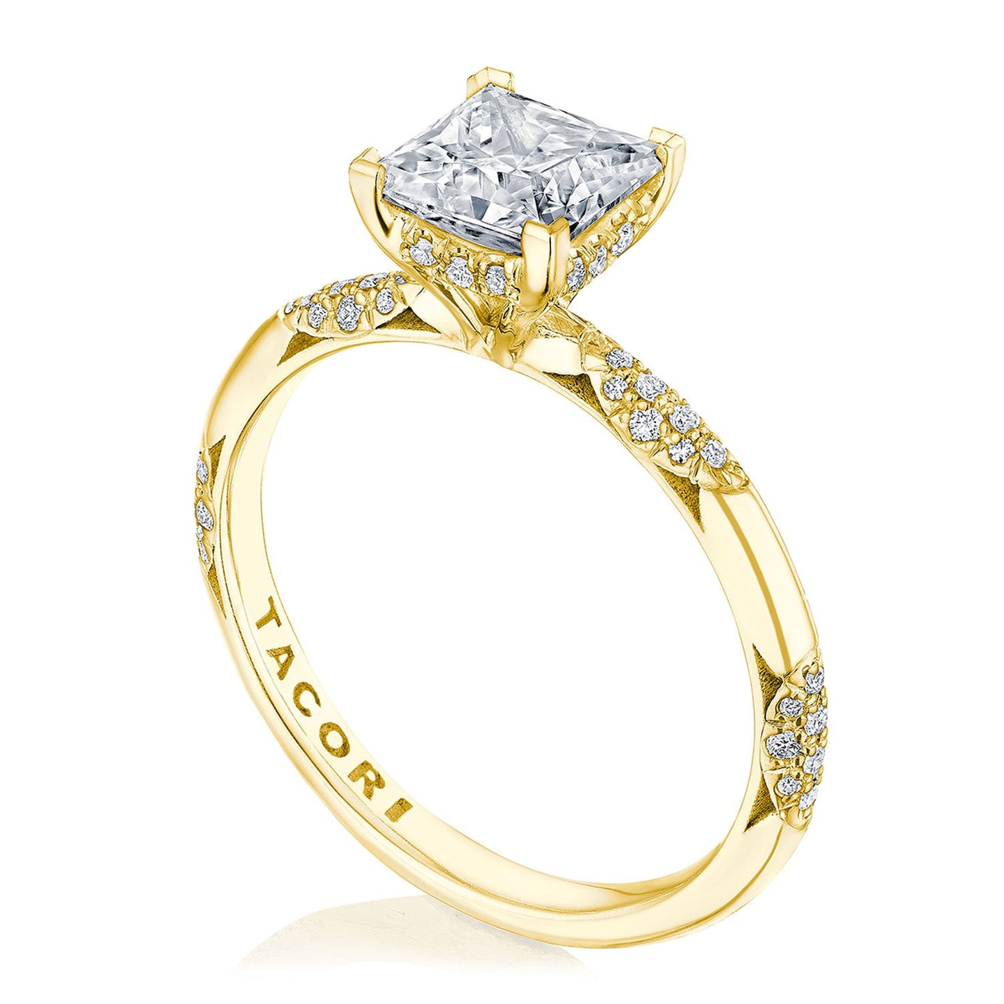 This exquisite Tacori Founders Collection engagement ring in 18K yellow gold highlights a stunning princess solitaire diamond set prominently, featuring smaller diamonds along the band. It includes the signature Tacori crescent design and is engraved with "TACORI" on the inside.