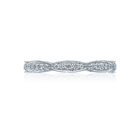 The Tacori Classic Crescent RoyalT Platinum Ring showcases a refined design with a band adorned by small diamonds set in an intricate milgrain pattern. The marquise shapes form elegant clusters, evoking a vintage charm reminiscent of classic crescent styles, making it an ideal choice for diamond engagement rings. Displayed against a plain white background, the ring exudes timeless sophistication.