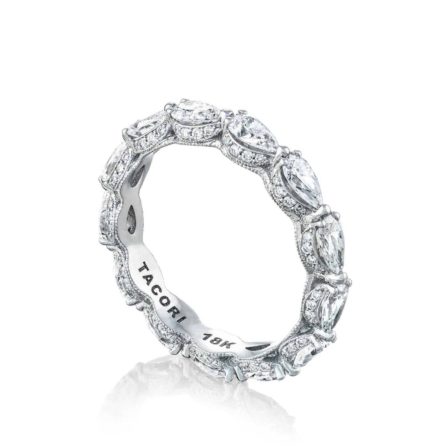 The Tacori Classic Crescent RoyalT Platinum Pear Diamond Anniversary Ring showcases an elegant, vintage-style design featuring marquise-cut and pear-shaped diamonds. Expertly crafted by Tacori gemologists, the inner band is engraved with "Tacori 18K.