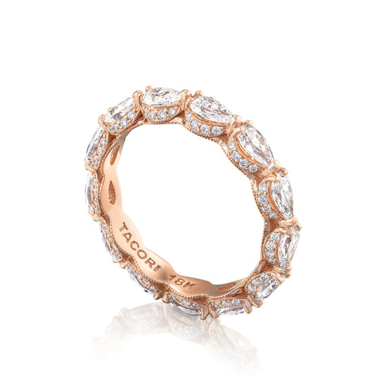 The Tacori Classic Crescent RoyalT 18K Rose Gold Pear Diamond Anniversary Ring features a breathtaking array of marquise-cut and pear-shaped diamonds that encircle the band, offering an elegant and sparkling design. Engraved with "Tacori" and "18K," it showcases the meticulous craftsmanship of Tacori gemologists.
