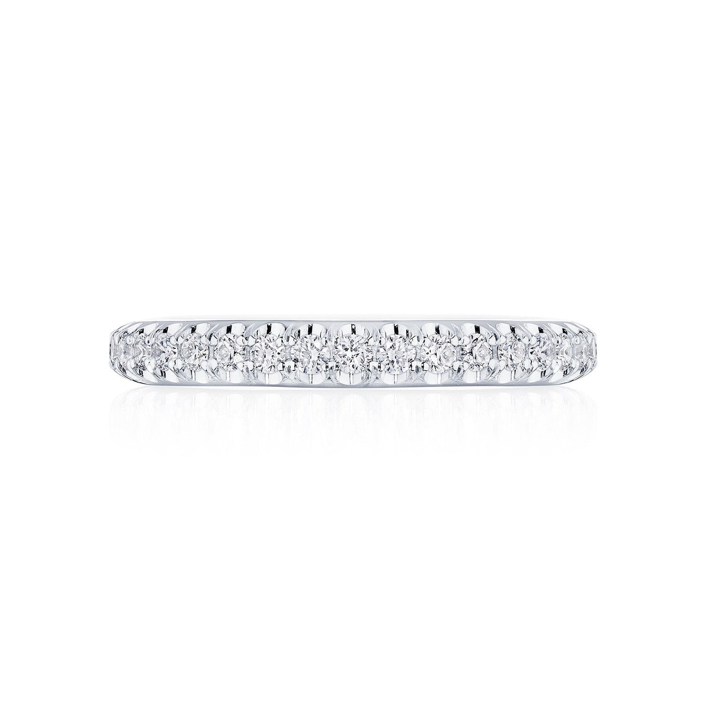 This exquisite platinum eternity ring from Tacori's Founder's Collection showcases a row of pavé-set round brilliant diamonds that shimmer beautifully along its band. The Tacori signature design enhances the elegance of this timeless piece.