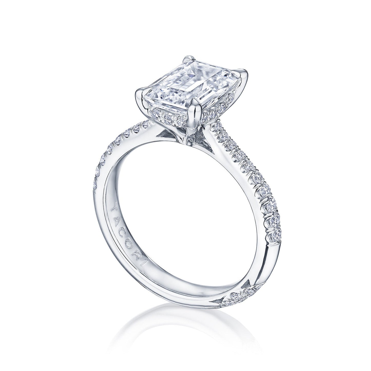 The Tacori Founder's Collection RoyalT Platinum Emerald Solitaire Semi Mount with Diamond Band Engagement Ring showcases a large, rectangular diamond in a claw setting. The platinum band is adorned with smaller diamonds, enhancing the ring's elegant and sparkling design.