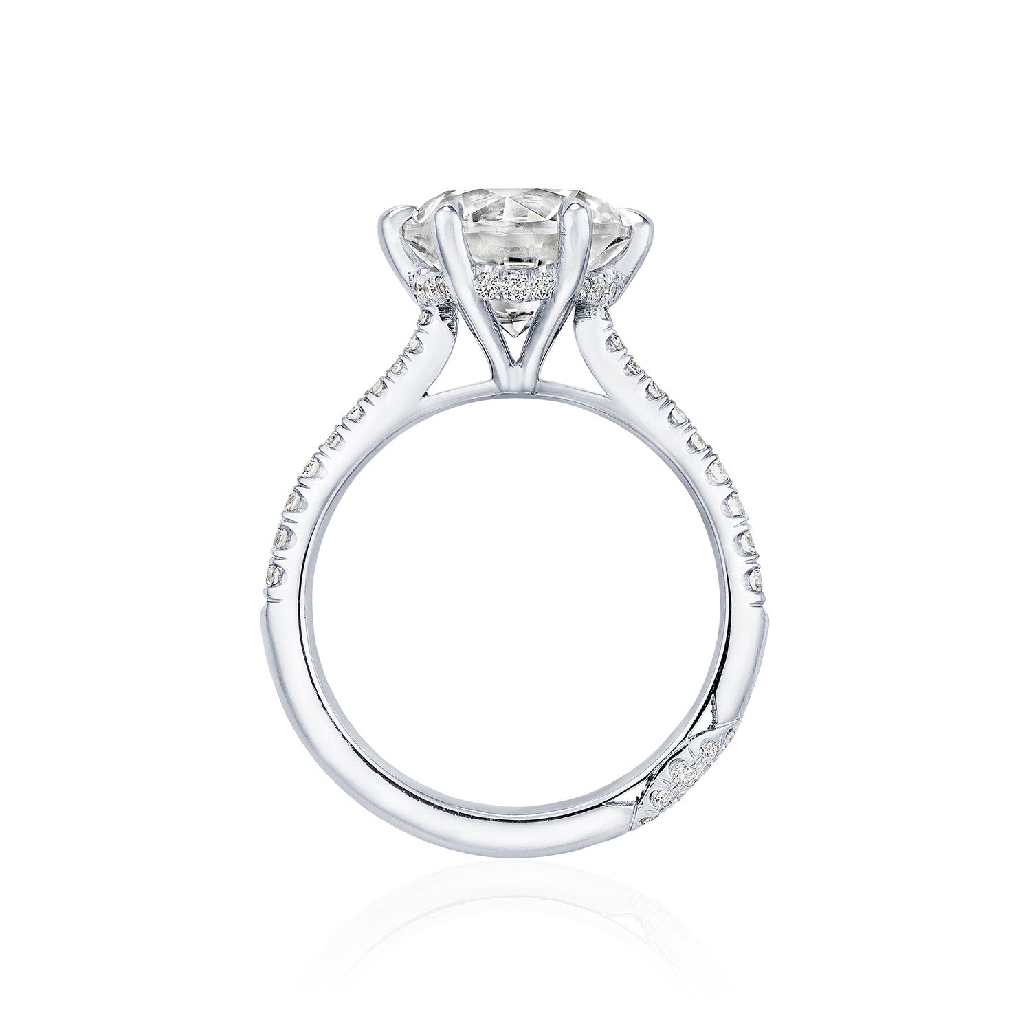 Side view of the Tacori Founder's Collection RoyalT Platinum engagement ring, featuring a stunning round brilliant diamond solitaire in a prong setting. The band is elegantly embellished with small diamonds, enhancing the intricate detailing of this exceptional piece, ideal for those in search of sophisticated engagement rings.