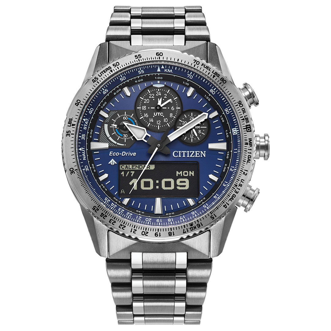 The CITIZEN Promaster Skyhawk U830 Eco-Drive 43mm watch features a stainless steel case, blue dial, analog-digital chronograph display with multiple subdials, metal link bracelet, and shows the date, day (Monday), and time (10:09) on its digital screen.