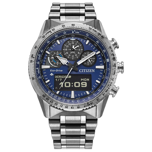 The CITIZEN Promaster Skyhawk U830 Eco-Drive 43mm watch features a stainless steel case, blue dial, analog-digital chronograph display with multiple subdials, metal link bracelet, and shows the date, day (Monday), and time (10:09) on its digital screen.