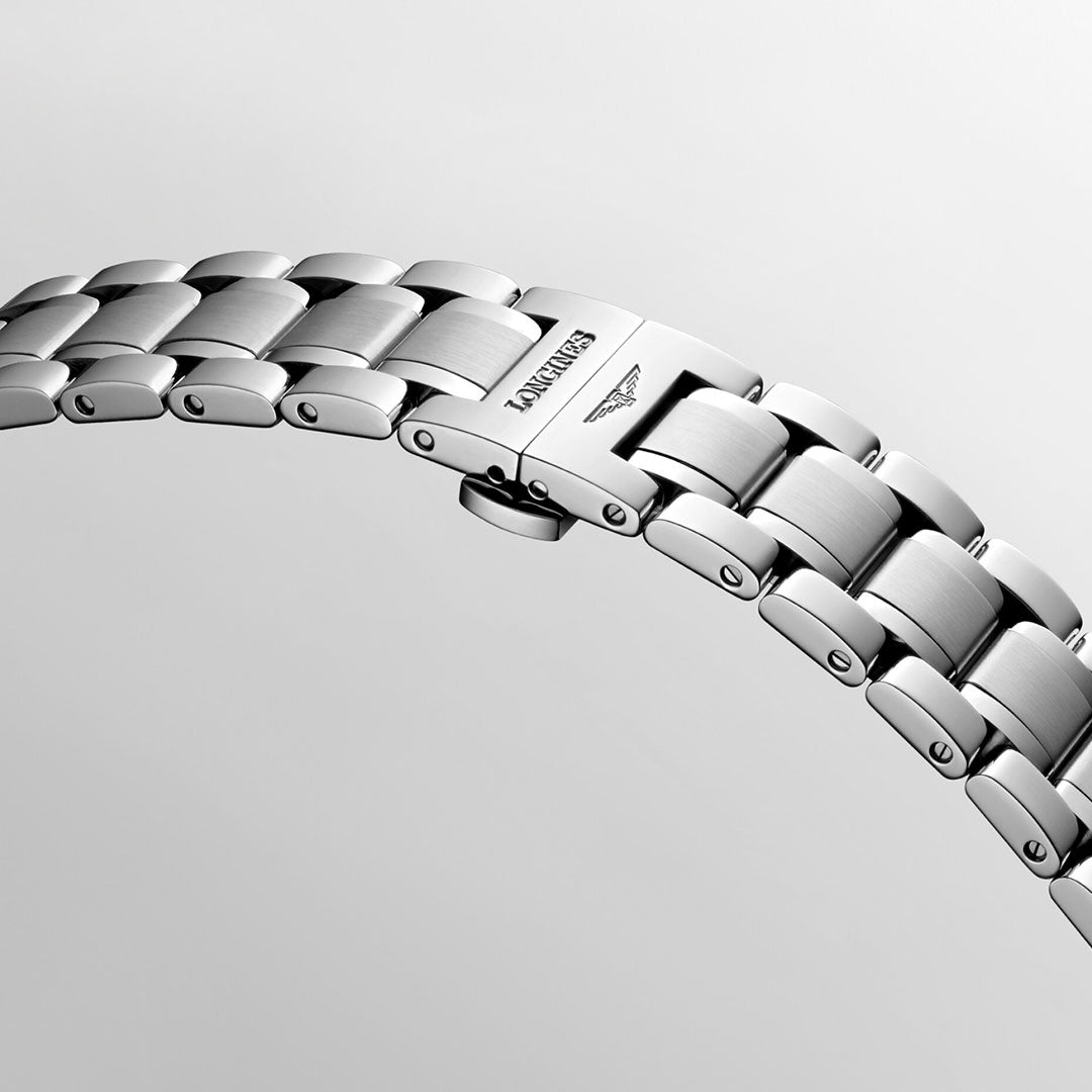 Close-up of a stainless steel watch bracelet with a polished finish, featuring a secured clasp. The word "LONGINES" is engraved on the clasp, enhancing its sleek design reminiscent of exceptional timepieces against a simple gray background.