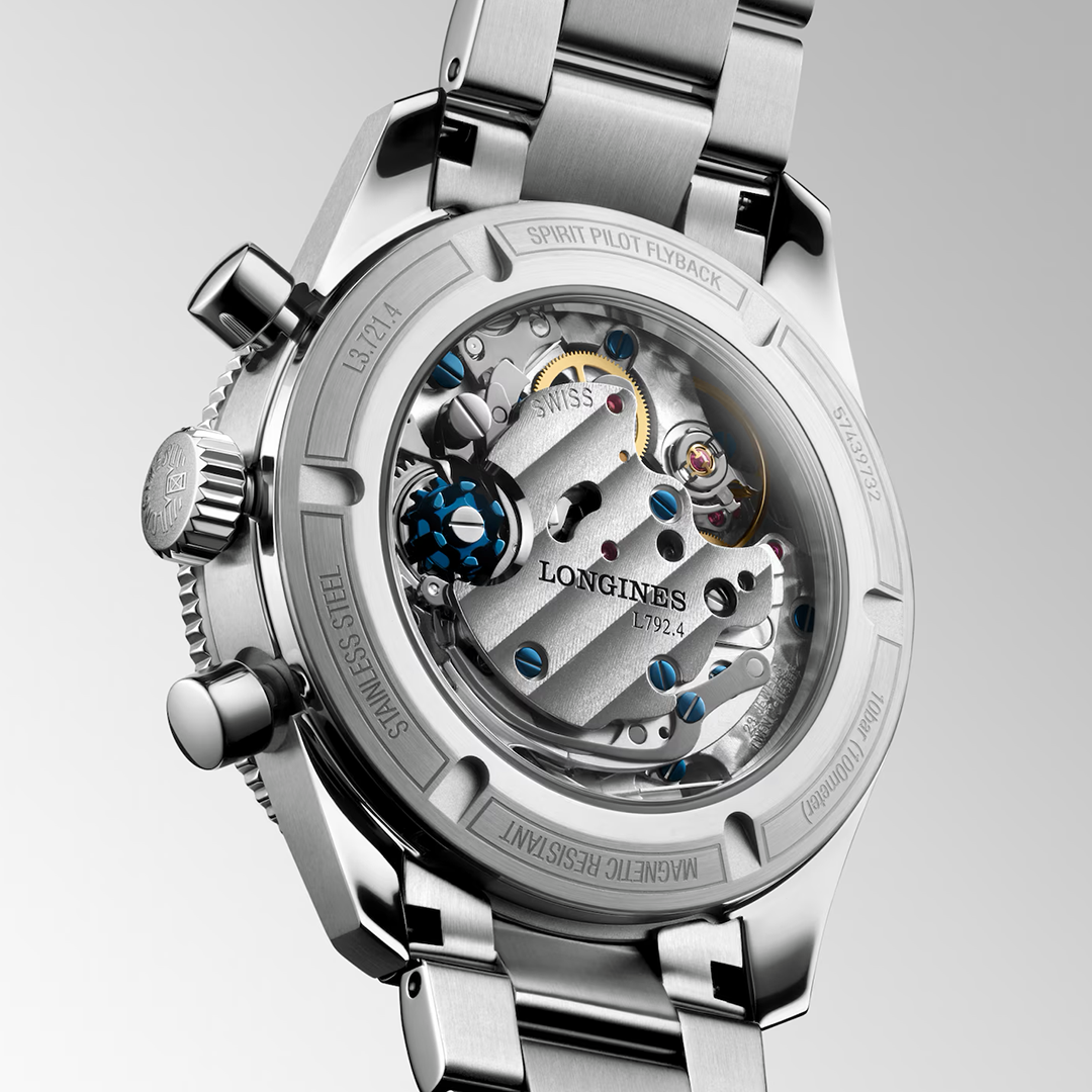 The exhibition case back of this Longines Spirit Pilot Flyback Automatic Manual Winding 39.5mm Watch reveals the internal mechanical movement, with descriptive text engraved around the stainless steel rim.