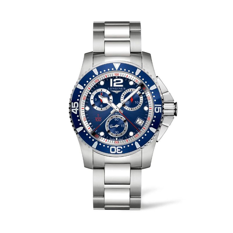 The Longines HydroConquest Quartz 41mm Watch from the Longines Sport Collection is a Swiss timepiece that merges elegance with practicality. This silver-and-blue sports chronograph features a metal bracelet, a blue bezel, three subdials, and a date display, highlighted by bold numerals and hands with striking red and white accents.