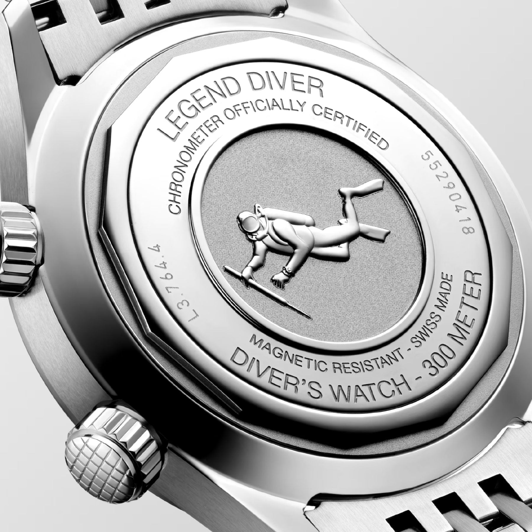 The back of the Longines Legend Diver Automatic 39mm Watch prominently features the phrases "Chronometer Officially Certified," "Magnetic Resistant," and "Diver's Watch - 300 Meter" alongside its brand, Longines. At the center is an embossed diver in gear, with visible serial numbers.