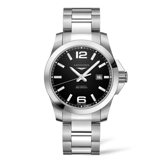 The Longines Conquest Classic Automatic 43mm Watch is a silver timepiece with a black face, featuring large white numerals at the 12 and 6 positions. It includes a date window at 3 o'clock and comes with a metal link bracelet.