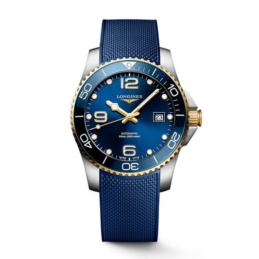 Introducing the Longines HydroConquest Automatic 41mm Watch by Longines, a luxury wristwatch featuring a blue dial and a gold and silver notched bezel with an elegant matching strap. The dial is adorned with white numerals, gold hands, and includes a date display, while the textured design of the strap completes its sophisticated look.