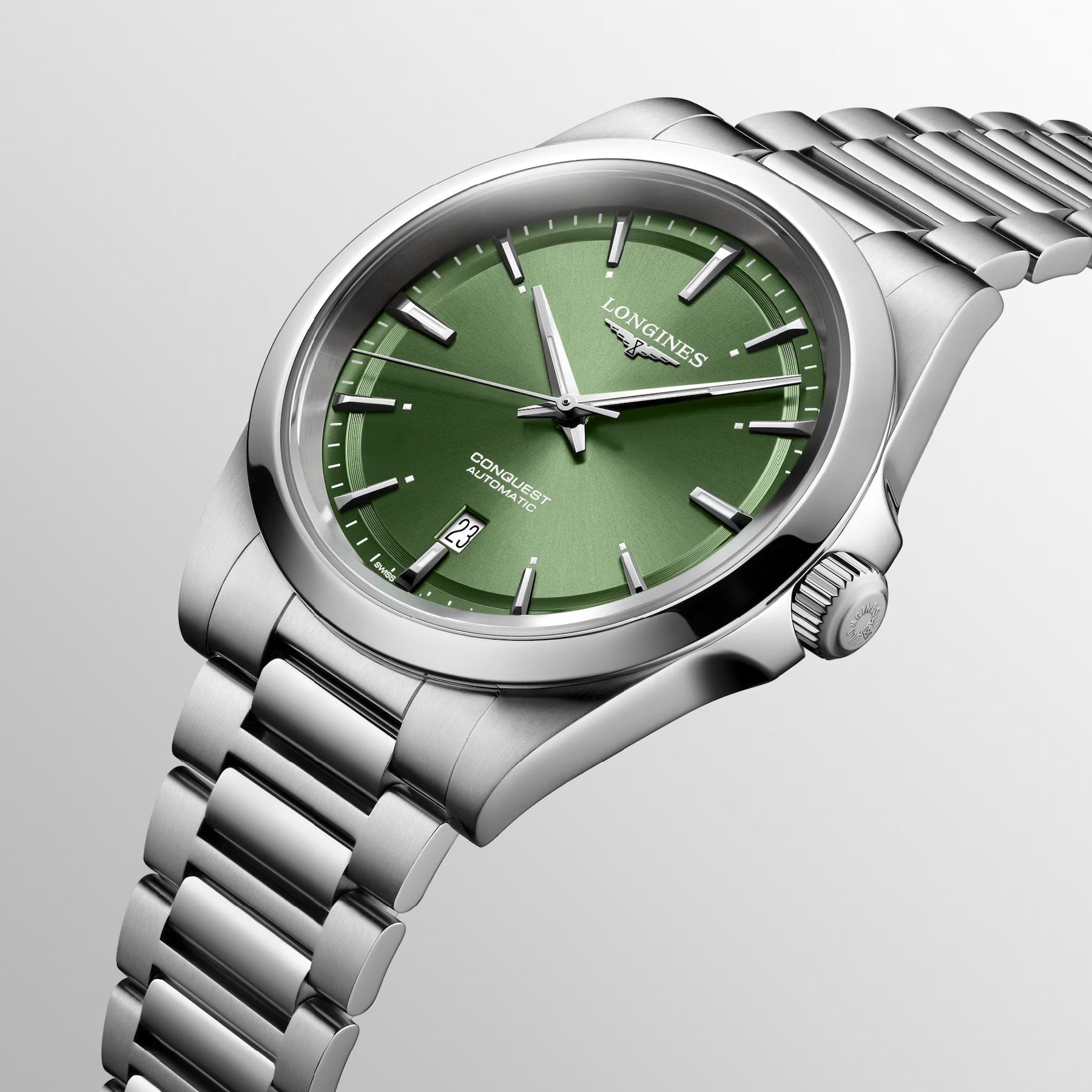 The Longines Conquest Automatic 41mm Watch is an elegant silver timepiece featuring a green face and a date display set to the 25th. Its metal link band harmonizes with the long, thin hour markers in a minimalist design, making it ideal for those who appreciate both style and performance.