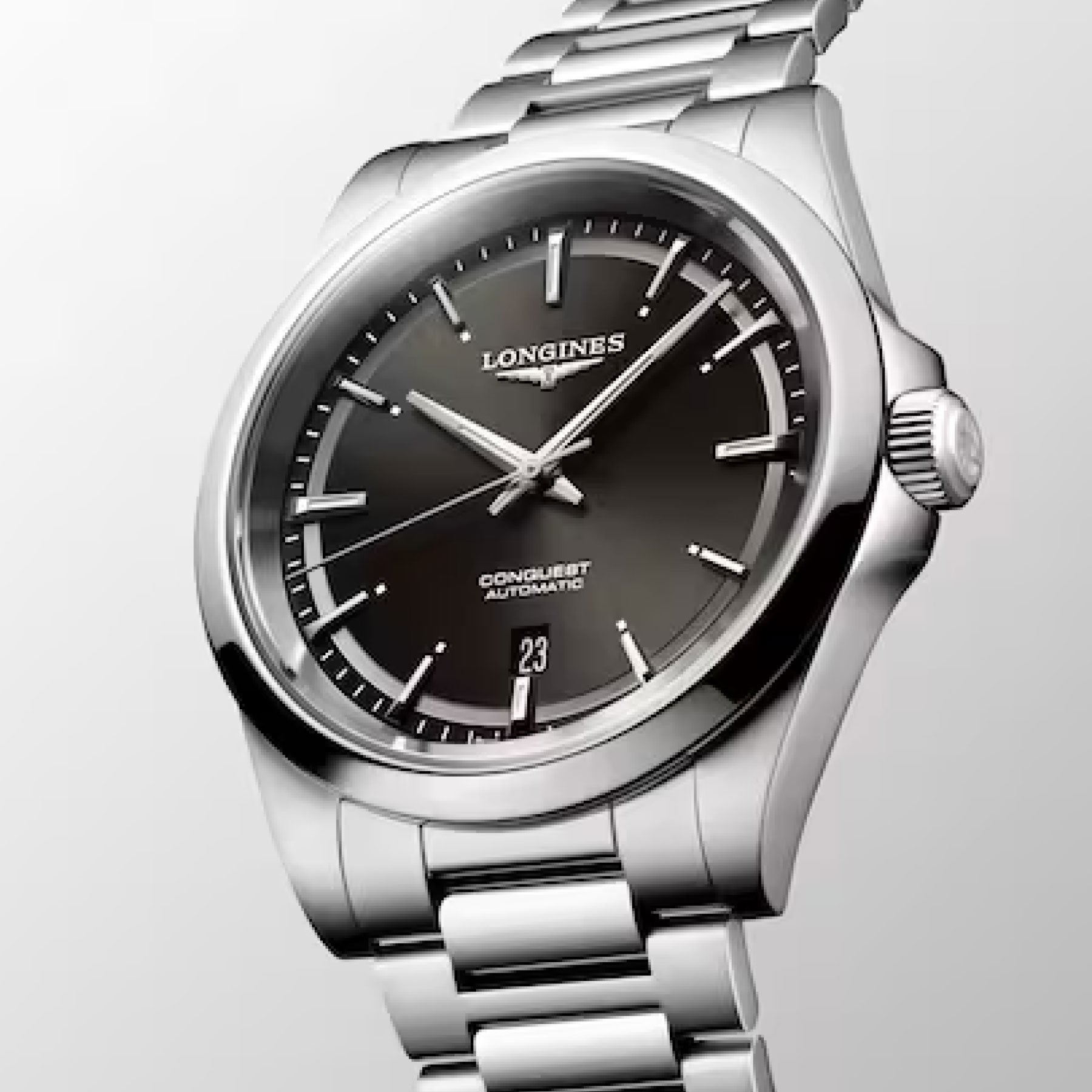 The Longines Conquest Automatic 41mm Watch by Longines features a black dial with silver hour markers and a date window at the 3 o'clock position. It boasts a stainless steel bracelet and a polished finish.