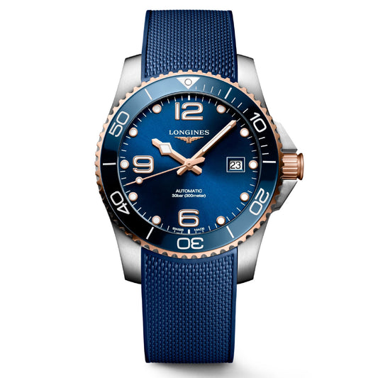 The Longines HydroConquest Automatic 41mm Watch is a stylish timepiece featuring a blue face with large numbers, a silver casing, and a rotating bezel accented with gold. It includes a blue strap, displays the date, and prominently features "Longines" on the dial.