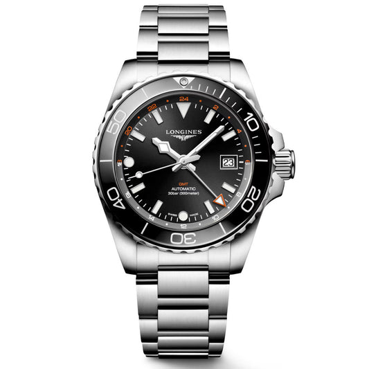 The Longines HydroConquest Automatic 41mm Watch boasts a stainless steel design and features a black dial with white and orange accents. Powered by Longines GMT movement, it includes hour markers, a date window, and a 24-hour function. The watch is completed with a seamlessly rotating black ceramic bezel atop its metal bracelet strap.