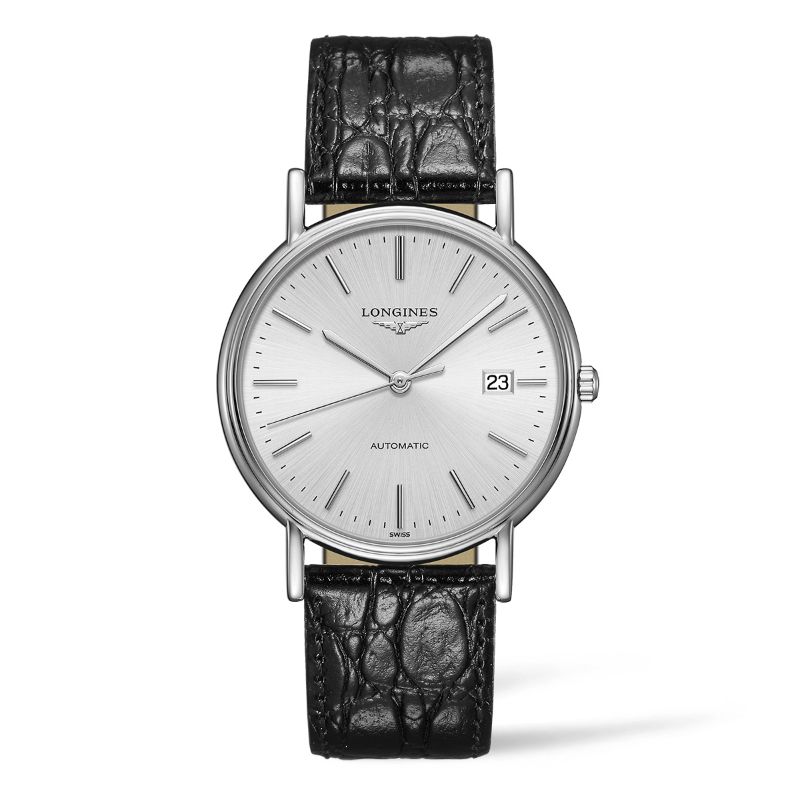 Embrace classic sophistication with the Longines Présence Automatic 38.5mm Watch. This timepiece, designed by Longines, showcases a silver-toned dial paired with a black leather strap and a round face adorned with slender hour markers and a convenient date window at 3 o'clock. Its scratch-resistant sapphire crystal guarantees both durability and style.