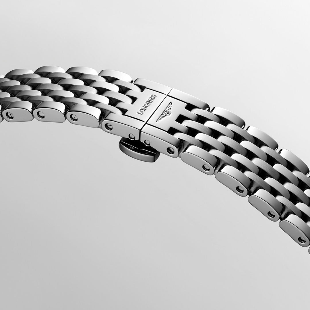 A close-up of the Longines Elegant Collection Moonphase Quartz 30mm Watch's silver bracelet, featuring a clasp engraved with "LONGINES" and the winged hourglass logo, highlights its water resistance against a plain light background.