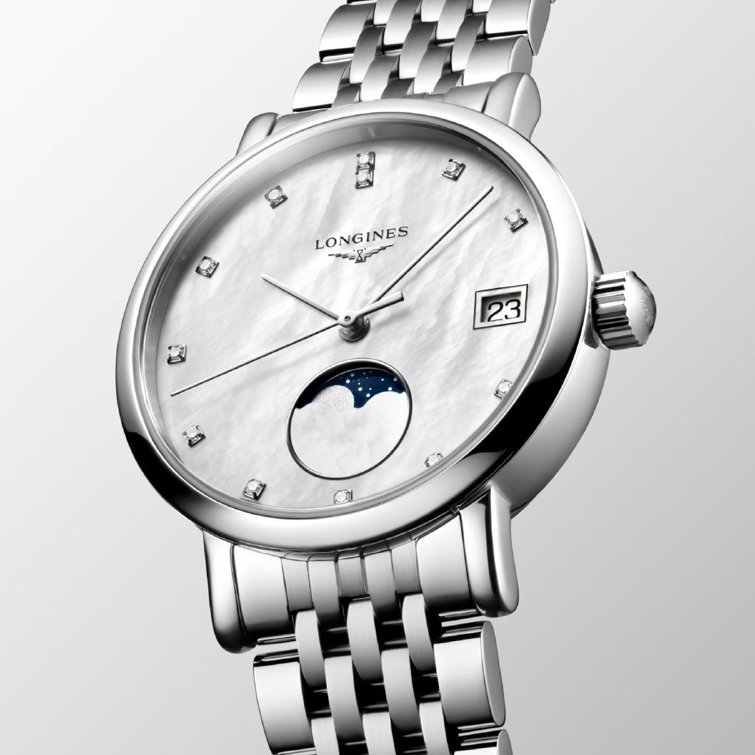 The Longines Elegant Collection Moonphase Quartz 30mm Watch features a silver-tone case, white mother-of-pearl dial with diamond hour markers, moonphase date display, metal link bracelet, sapphire crystal, and water resistance.